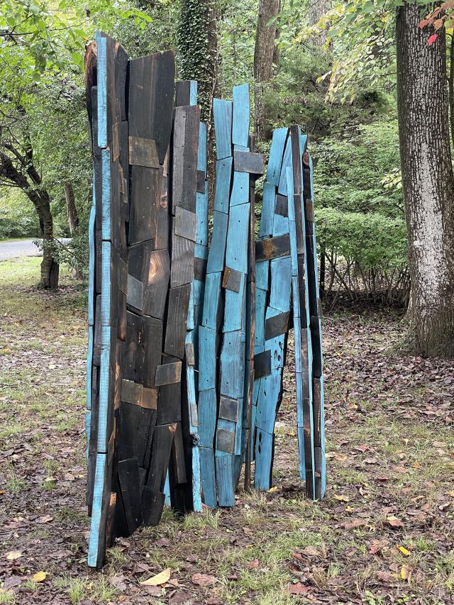 a sculpture of wood and metal by Ken Hiller
